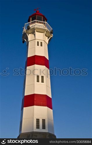 beautiful red striped lighthouse in Malmoe, Sweden