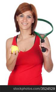 Beautiful redhead girl with a tennis racket isolated on a over white background