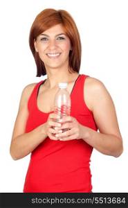 Beautiful redhead girl with a water bottle isolated on a over white background
