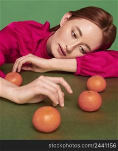 beautiful redhead woman posing with fruits 4