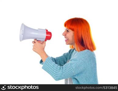 Beautiful redhead woman with a megaphone isolated on a white background