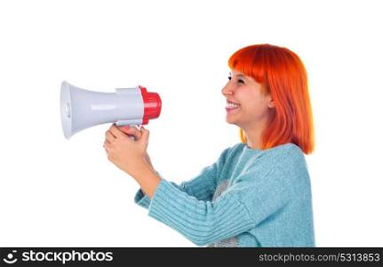 Beautiful redhead woman with a megaphone isolated on a white background
