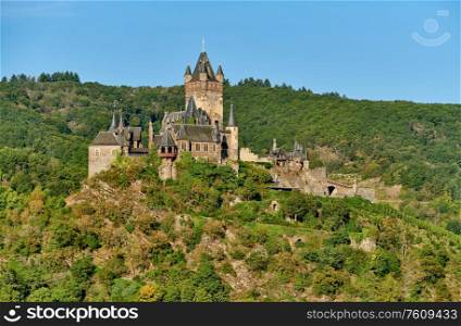 Beautiful Reichsburg castle on a hill in Cochem town, Germany