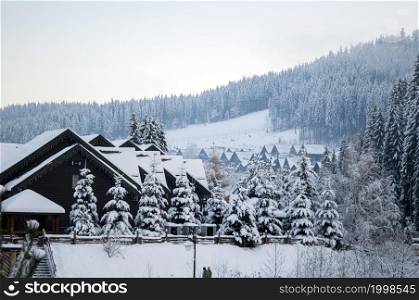 beautiful resort town of Bukovel in winter, the theme of mountain sports, skiing, Bukovel, Carpathian mountains Ukraine, new year, Christmas, holidays