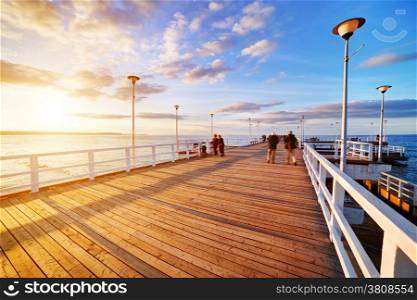 Beautiful retro pier at sunset over Baltic sea. Gdansk Brzezno, Poland