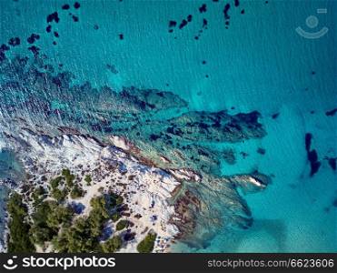 Beautiful rocky coastline top aerial view drone shot, Sithonia, Greece