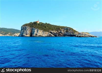 Beautiful rocky sea coast of Palmaria, Tino and Tinetto islands near Portovenere (Gulf of Poets, Cinque Terre National Park, La Spezia, Liguria, Italy). Lighthouse on Tino island.