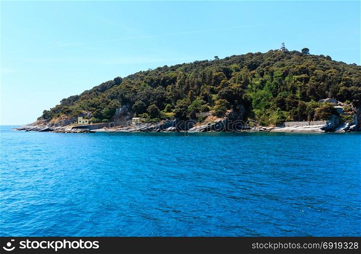 Beautiful rocky sea coast of Tino island (with lighthouse) near Portovenere (Gulf of Poets, Cinque Terre National Park, La Spezia, Liguria, Italy).