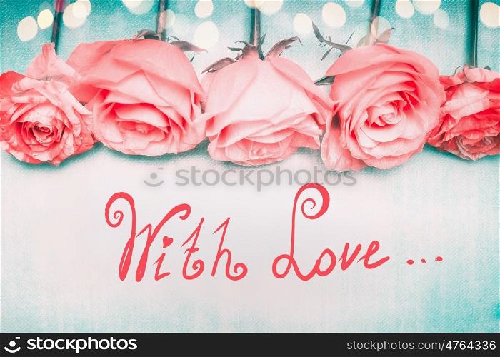 Beautiful romantic roses border on blue background with bokeh and lettering With Love in pastel color, greeting card