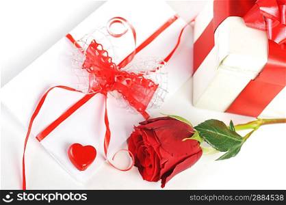 beautiful rose, red heart and letter with ribbon close up