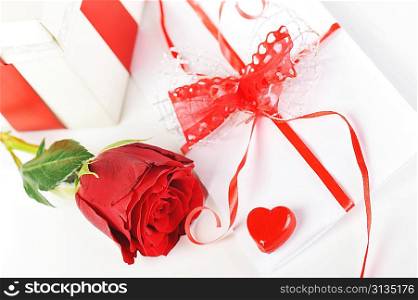 beautiful rose, red heart and letter with ribbon close up