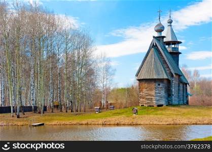 beautiful rural landscape with wooden church