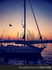 Beautiful sailboat on sunset, yachts harbor in the Greece, wonderful place for summer adventure, luxury water sport