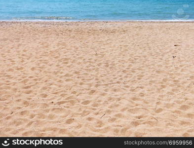 Beautiful sand beach with sea water. Beautiful sand beach