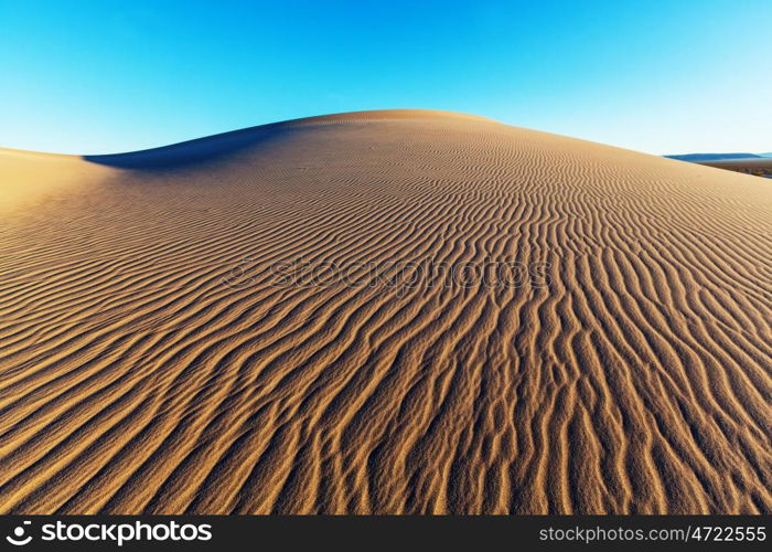 Beautiful sand dunes in desert at the sunrise.Death Valley,Neada,USA.