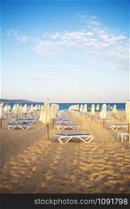 beautiful sandy beach with sun loungers - vacation, sea, sun.. beautiful sandy beach with sun loungers - vacation, sea, sun