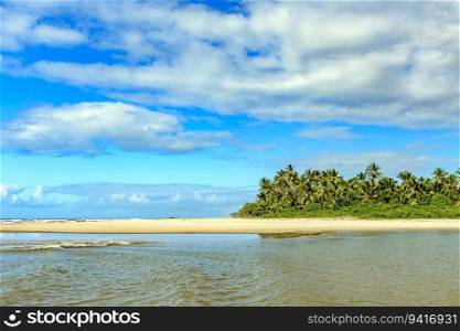 Beautiful Sargi beach with its coconut trees in the city of Serra Grande on the coast of Bahia. Beautiful Sargi beach with its coconut trees
