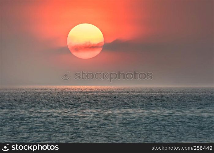 Beautiful scence of big sun on sky over the sea. big sun and sea