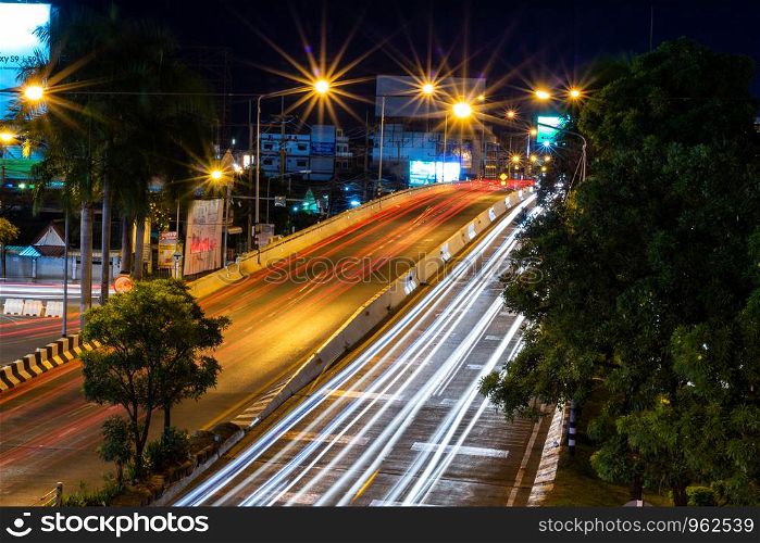 Beautiful scene of The color of Night traffic lights on the Road in Phitsanulok City, Thailand. June 1, 2018