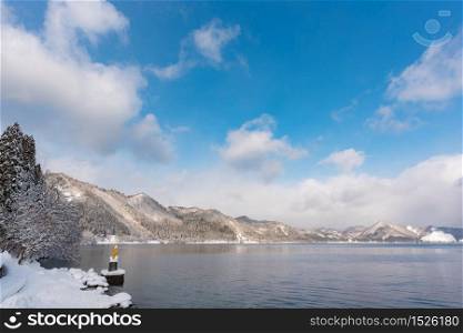 Beautiful scenery of lake tazawa or tazawako cover by snow in winter Akita Japan.