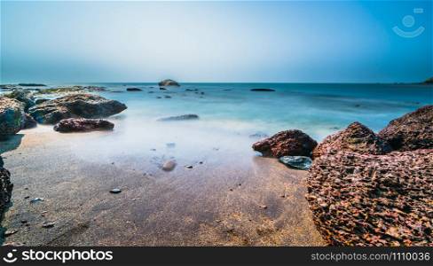 Beautiful scenery of long expsoure at Anjuna Beach, Goa