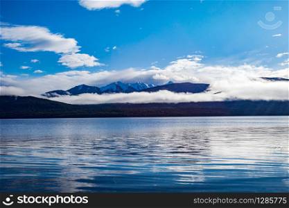 beautiful scenic of blue sky white cloud of lake te anau most popular traveling destination in new zealand