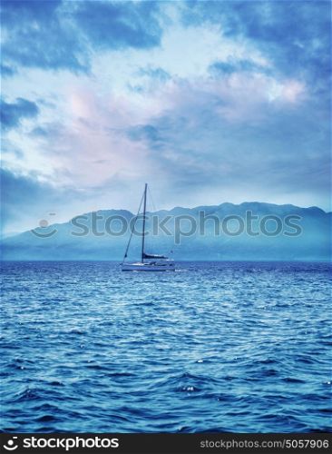Beautiful sea landscape, yacht sailing away, summer time activity, beauty of nature, traveling to Greek island, Europe