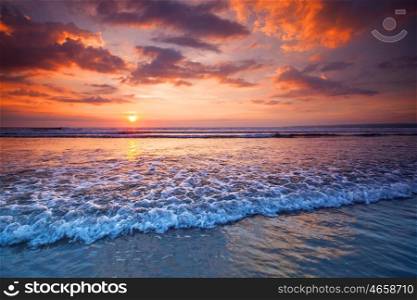 Beautiful sea sunset. Beautiful view on sea with coming surf waves unsed sunset sky