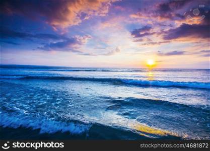 Beautiful sea sunset. Beautiful view on sea with coming surf waves unsed sunset sky