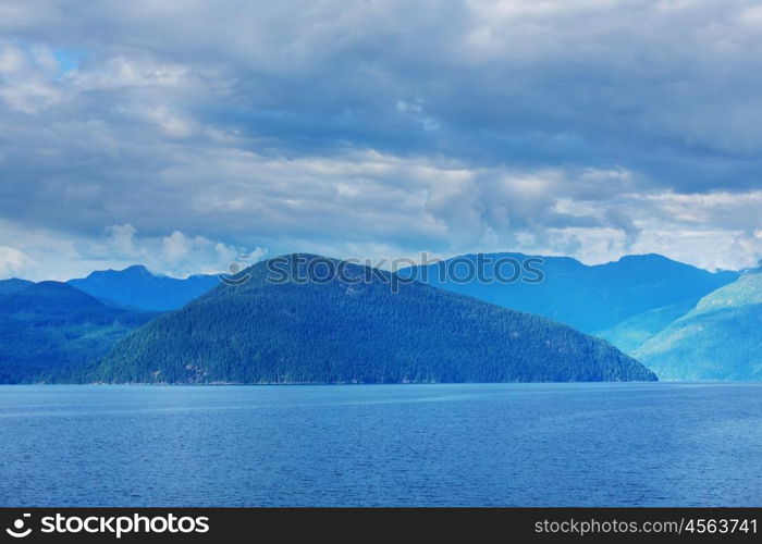 Beautiful seascape along Pacific coast of British Columbia, Canada, with rocky shoreline.