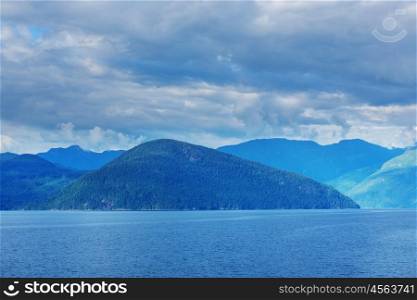 Beautiful seascape along Pacific coast of British Columbia, Canada, with rocky shoreline.