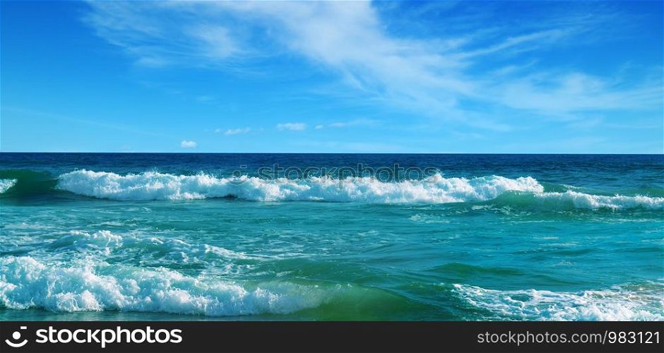 Beautiful seascape and blue sky. Sand beach. The concept is travel. Wide photo.