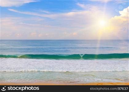 beautiful seascape and sun on blue sky background