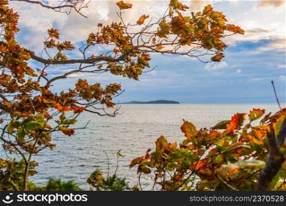 Beautiful seascape, autumn sea, clouds over the water surface, autumn on the seashore.