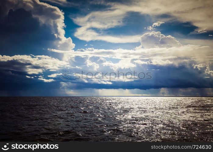 Beautiful seascape evening Baltic sea sunset horizon and cloudy sky. Tranquil landscape scene.