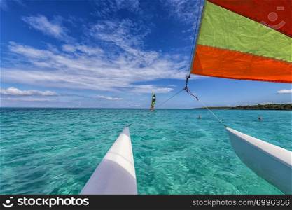 Beautiful seascape from the catamaran to Atlantic ocean and coastline, Turquoise water and blue sky with clouds. Cuba