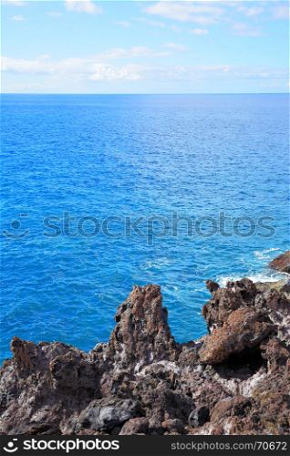 Beautiful seascape rocks and sea horizon, natural photo background, copyspace composition