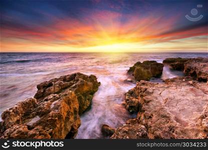Beautiful seascape. Sea and rock at the sunset. Nature composition.. Beautiful seascape