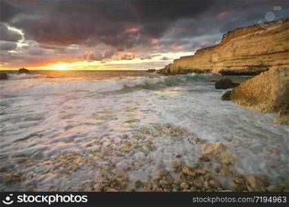 Beautiful seascape. Sea and rocks at sunset. Composition of nature.