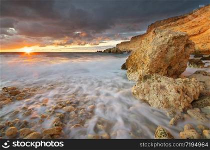 Beautiful seascape. Sea and rocks at sunset. Composition of nature.