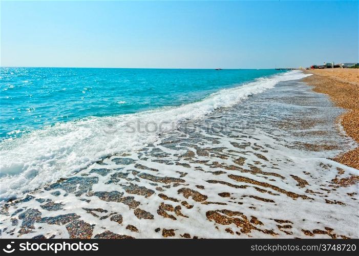 beautiful seascape. Sea foam on the shore