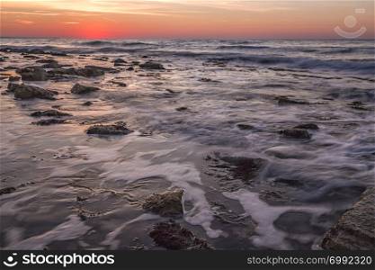 Beautiful seascape with rocks during sunrise. Beautiful natural seascape