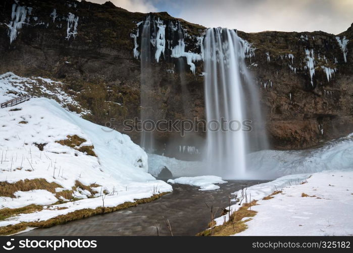 Beautiful Seljalandsfoss on a cold winter day, Iceland, Europe