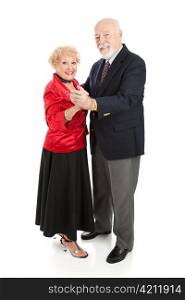 Beautiful senior couple dancing together. Full body isolated on white.