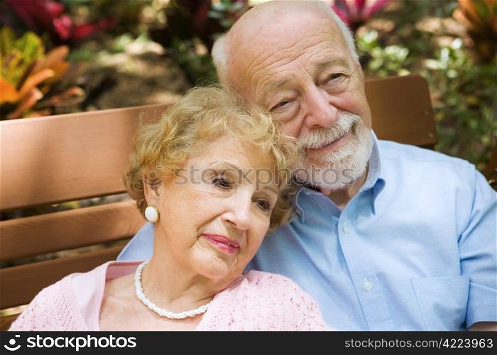 Beautiful senior couple relaxing and reminiscing about their life together.