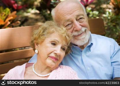 Beautiful senior couple relaxing and reminiscing about their life together.