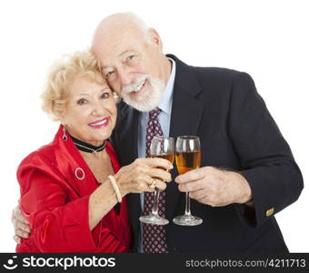 Beautiful senior couple toasting with glasses of champagne. Isolated on white.