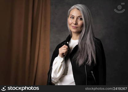 beautiful senior woman portrait wearing black jacket 2