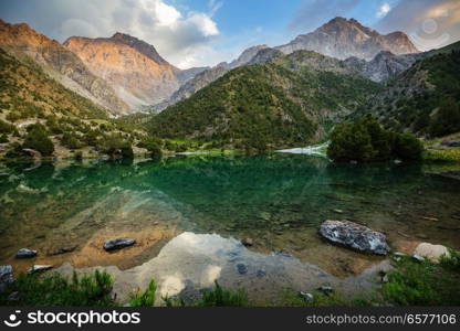 Beautiful serene lake in  Fann mountains  branch of Pamir  in Tajikistan.