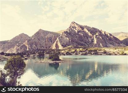 Beautiful serene lake in  Fann mountains  branch of Pamir  in Tajikistan.